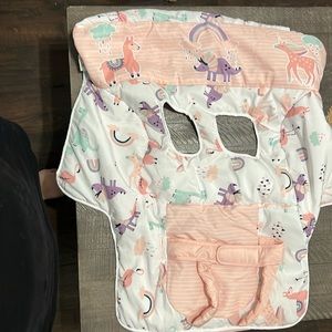 Shopping cart cover girl themed. Light coral, purple, teal colors